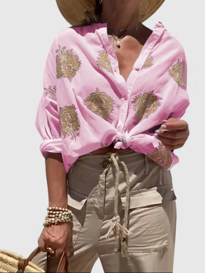 Dames blouse met bladprint en knoopsluiting