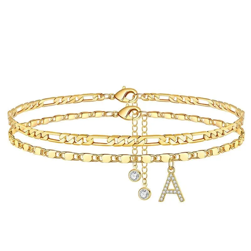 Gelaagde gouden enkelband met strass