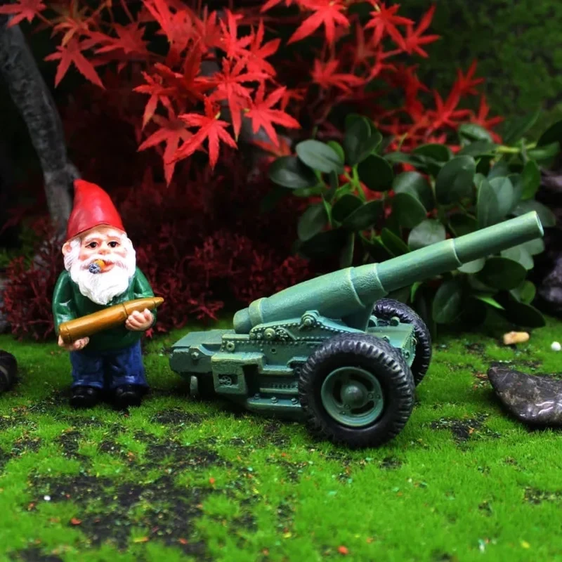 Halloween decoration, garden gnome with a military cannon, garden ornament, metal decorations